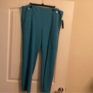 Teal/turquoise stretchy pants. NWT
Smoke/pet free home.